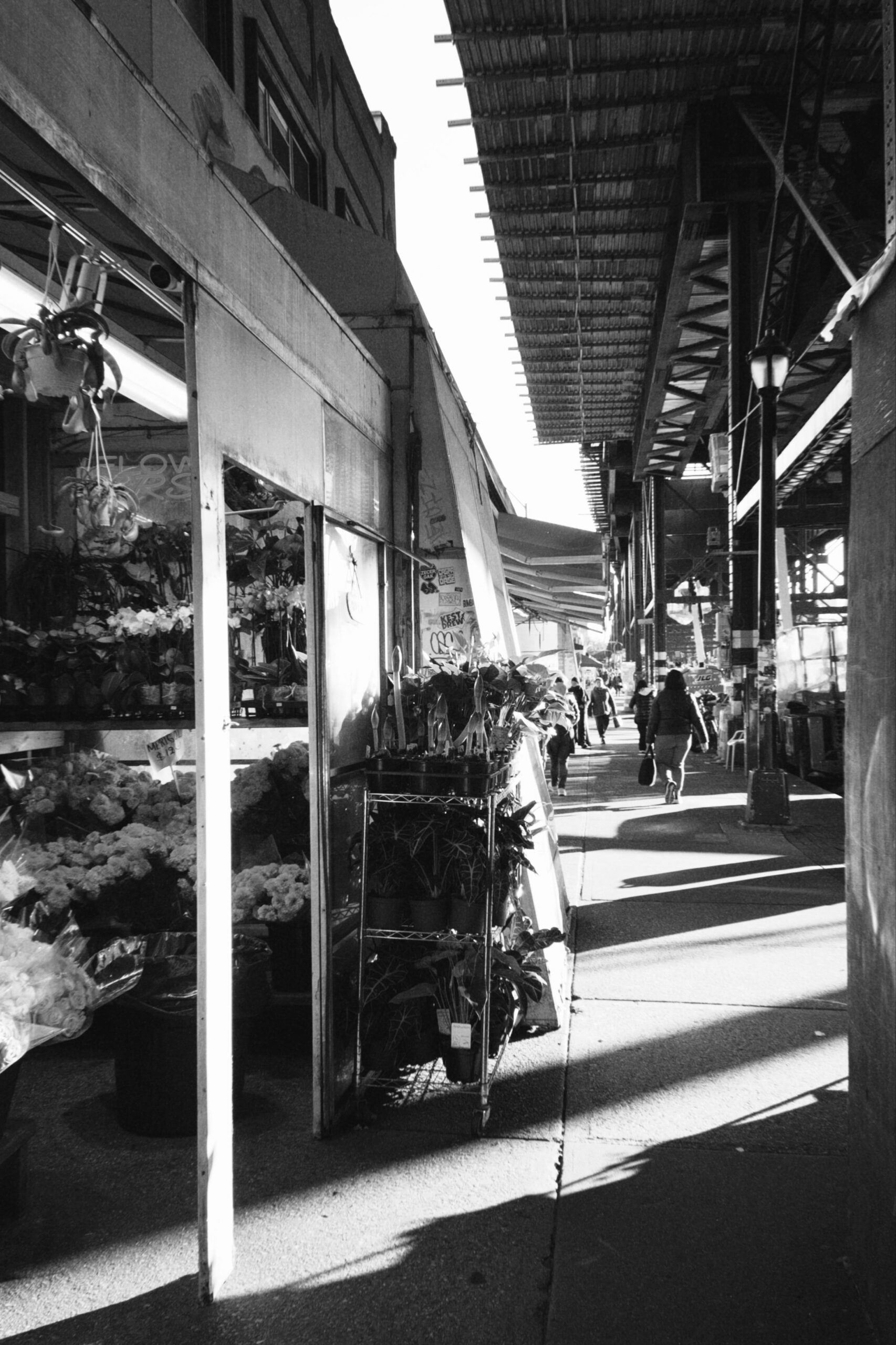 Flower stand near cafe in Brooklyn neighborhood