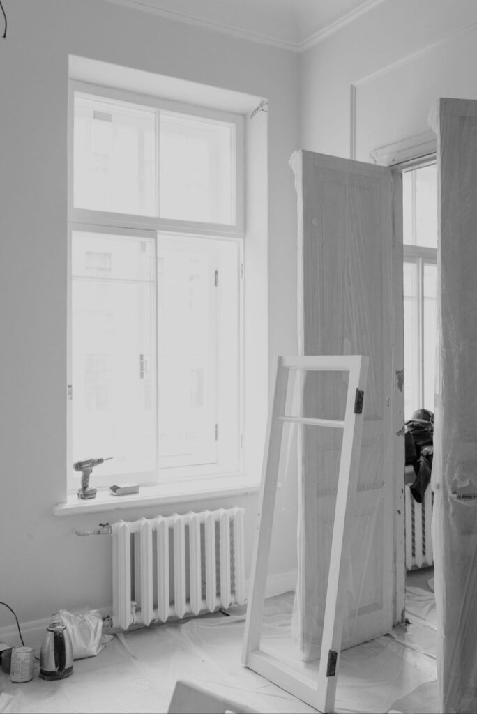 Modern Brooklyn Apartment under construction with heater and window sunlight